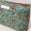 neceser verde flores art 01 scaled e1766345064950